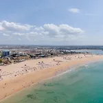 Sol & Areias Da Rocha